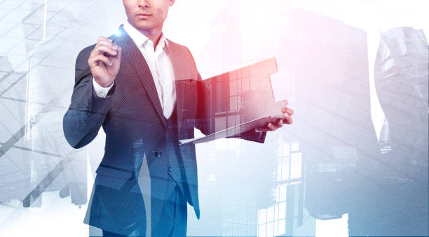 istock Businessman with clipboard writing in city 1221177432