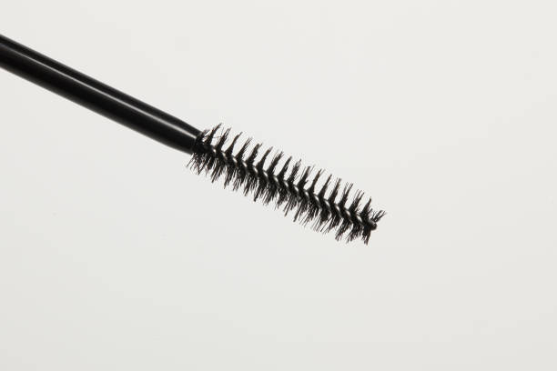 istock Close-up of a mascara brush with a white background 1221179902