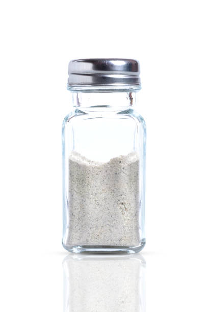 istock Ground pepper in a jar Isolated on white background Clipping Path. 1221179970
