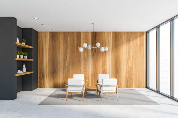 istock Gray office lounge with white armchairs 1221180816