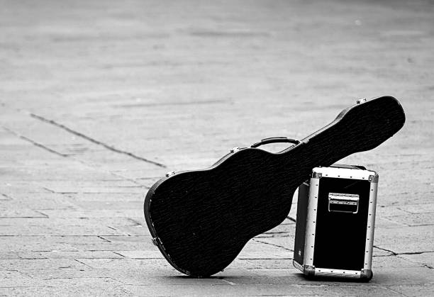 istock guitar case and a concert amplifier with black and white toned 1221182381