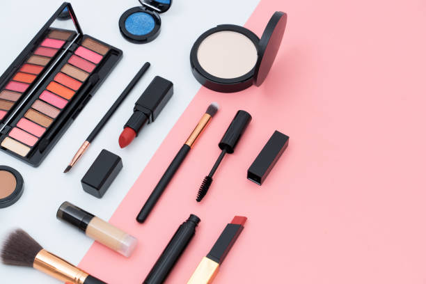 istock set decorative cosmetics on pink and white 1221186375