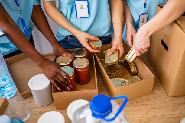 istock Group of mixed race people working in charitable foundation 1221186475