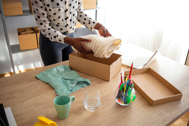 istock Working woman at online shop. 1221187719