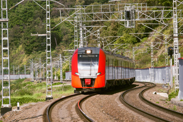 istock Passenger train moves by the mountain. Sochi. 1221188052