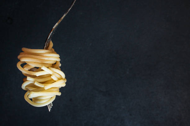 istock pasta spaghetti with tomato and basil, Menu concept healthy eating. food background top view copy space for text 1221190842