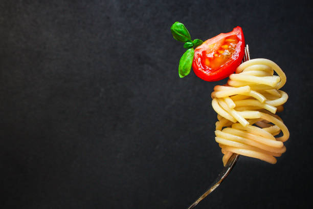istock pasta spaghetti with tomato and basil, Menu concept healthy eating. food background top view copy space for text 1221190844