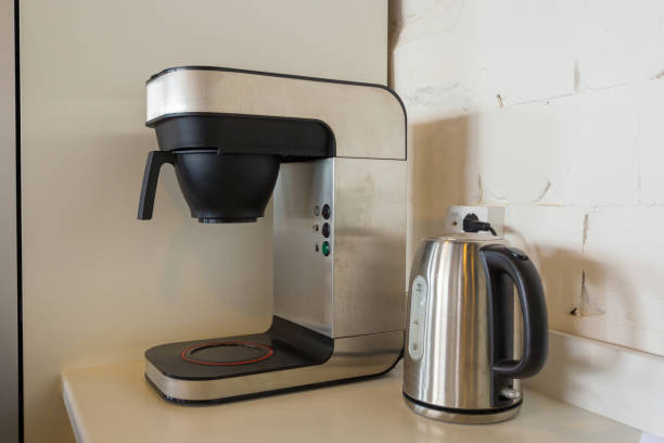 istock new modern coffee maker and kettle in the office kitchen 1221192085