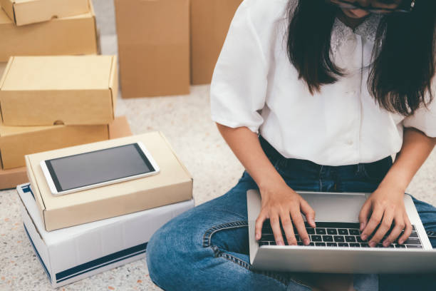 istock Start up online seller owner checking the customer orders 1221192355