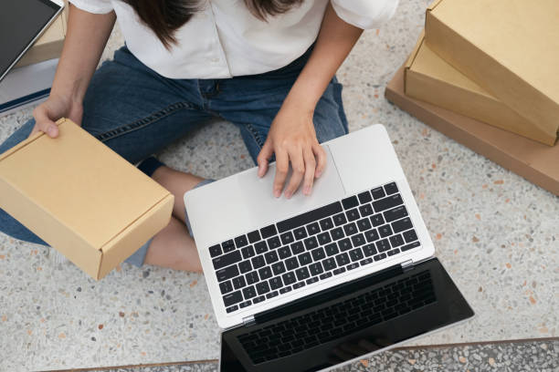 istock Start up online seller owner checking the customer orders 1221192374