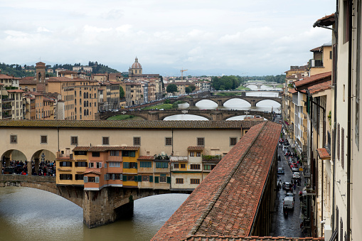 Florence, Italy - May 16, 2018. The Ponte Veccho Bridge over Arno River in Florence, Italy