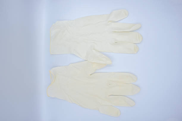 istock White medical glove on white background 1221193669