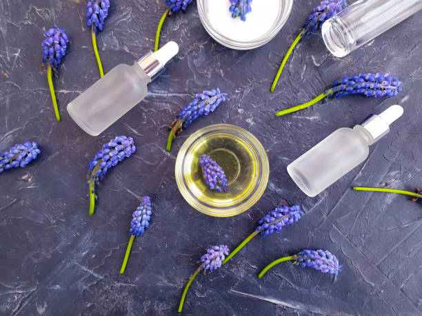 istock cream cosmetic blue flowers 1221197981