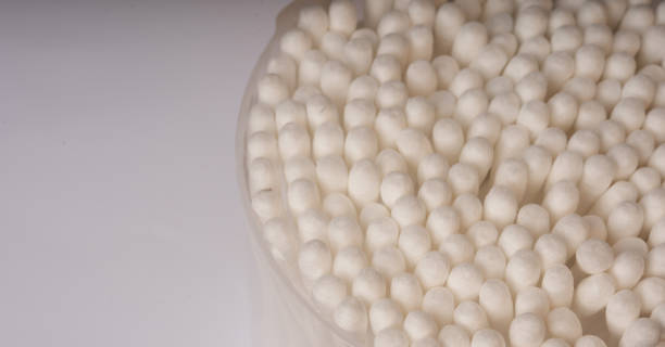 istock Cotton swabs are in transparent plastic box on white background 1221198017