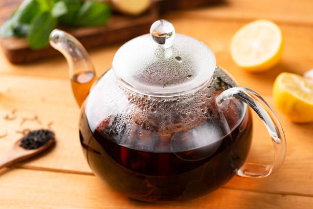 istock Glass pot with hot black tea 1221198238