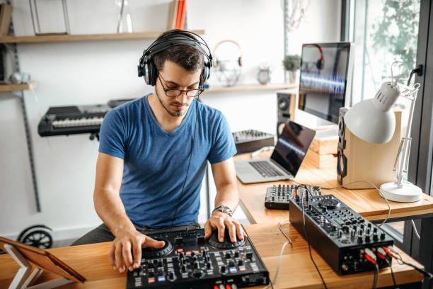istock I am enjoying music at my home 1221201173