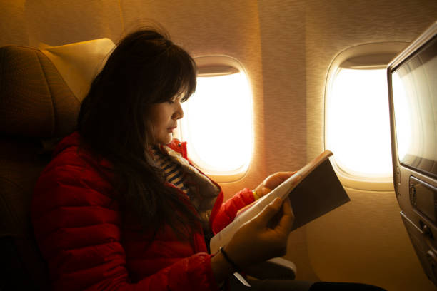 istock asian Female airplane passenger 1221204870