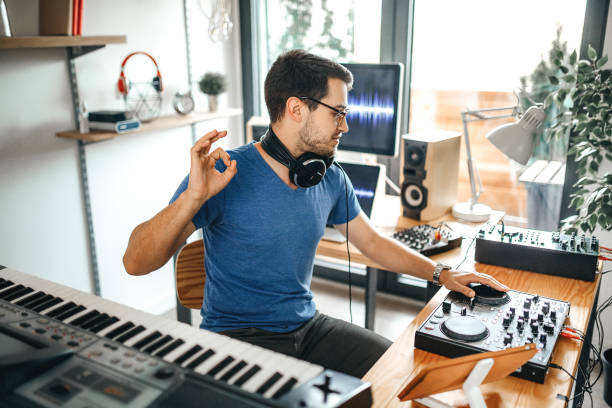 istock Music composer using electronic equipment to make music 1221206114