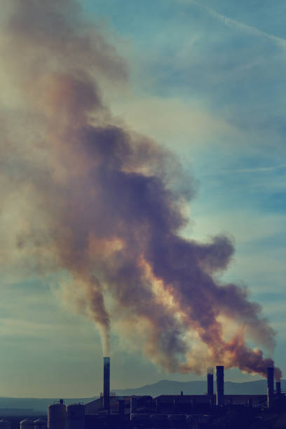 istock Power plant, smoke from the chimney. 1221206379
