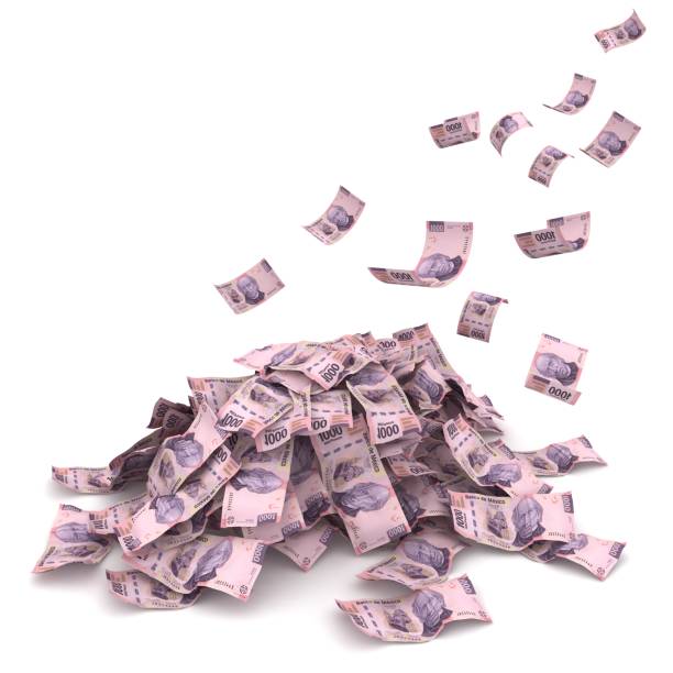 istock Mexican money peso falling finance crisis 1221206424