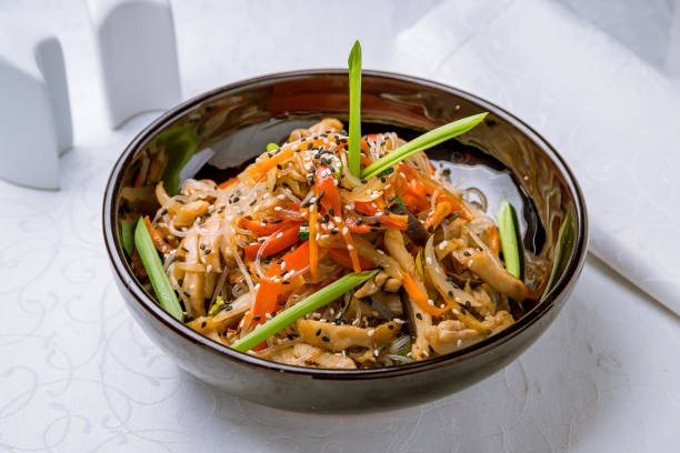 istock rice noodles with chicken and vegetables 1221207289