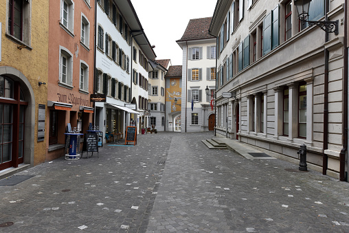 Bad Ischl, Austria, July 8, 2022: View of the Wirerstrasse street in the center of this town under summer cloudy sky. Bad Ischl in Upper Austria is known also as the place where the Austrian Emperor Franz Joseph I had a villa (not pictured).