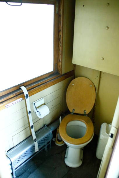 istock look into an old wc in an old railway wagon 1221208902