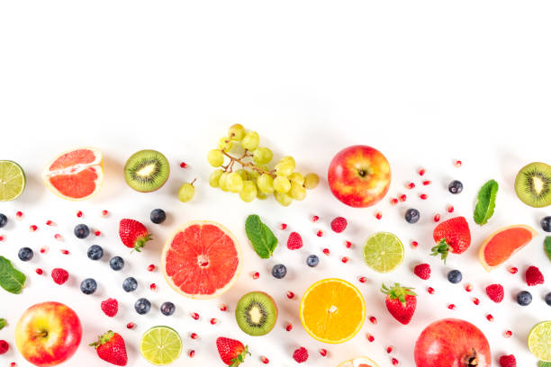 istock Fresh summer fruit, a flat lay on a white background, vibrant food pattern, shot from the top with a place for text 1221209278