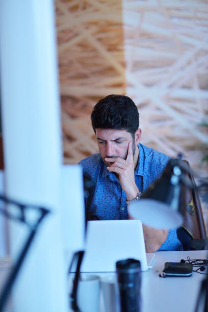 istock Successful business man working at the office 1221210632