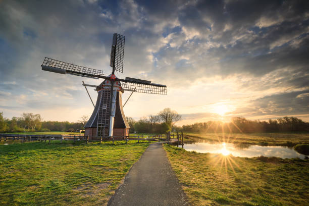 istock beautiful windmill in morning sunshine, Holland 1221210828