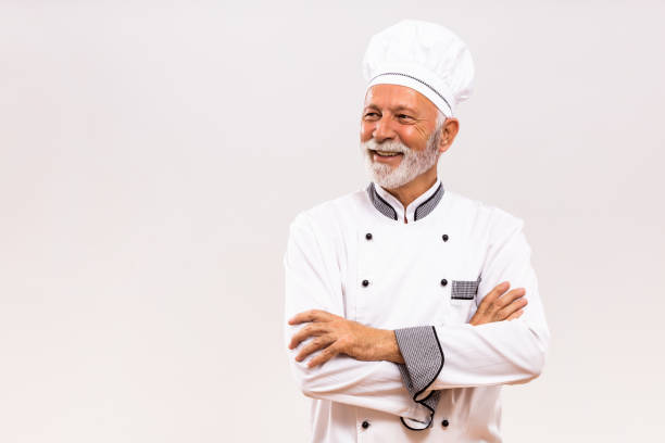 Portrait of senior chef thinking