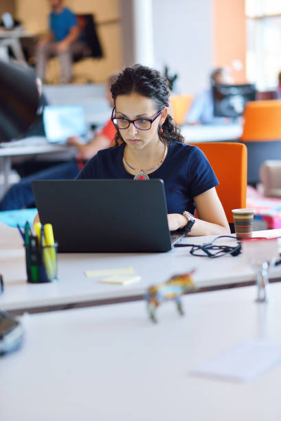 istock Successful business woman working at the office 1221212173