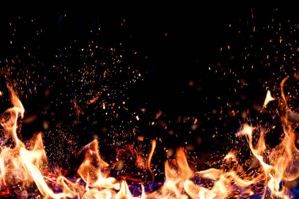 istock Flames of fire on a dark background. Copy space, place for text. 1221212358