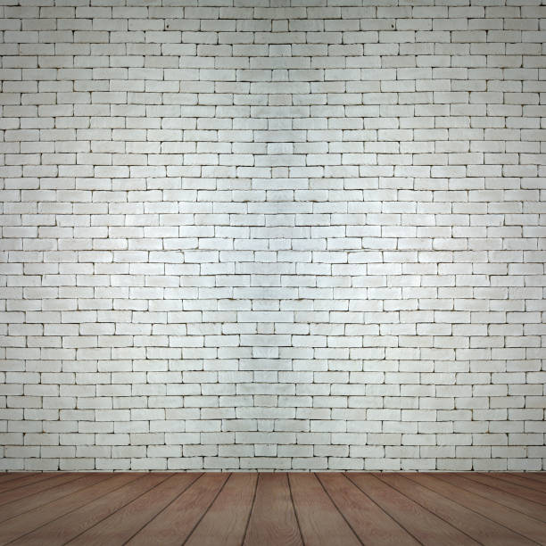 istock room interior vintage with white brick wall and wood floor background 1221214706