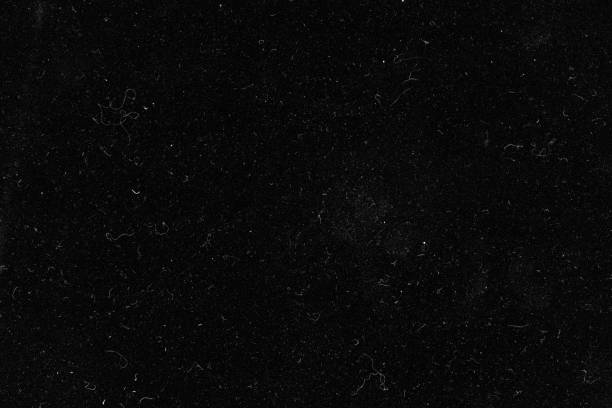 istock Dark cotton material with detritus, close-up texture 1221223078