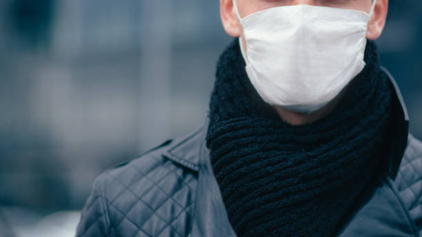 istock man in the protective mask is looking confidently ahead 1221225383