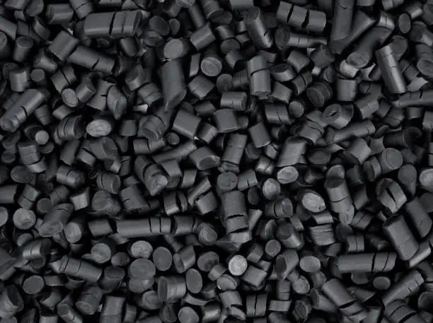 Black rubber granules background