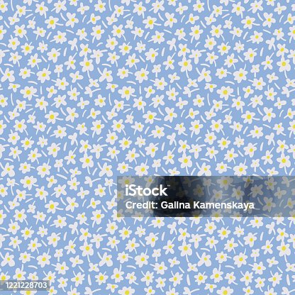 istock Seamless pattern made of small daisy flowers. Ditsy meadow ornament. Floral summer background. 1221228703