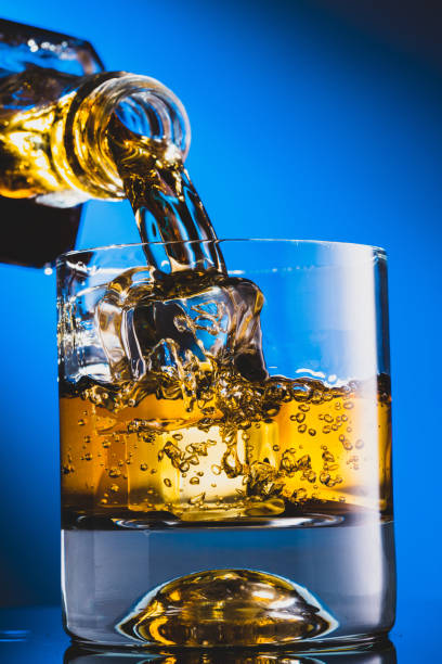 istock Glass of whiskey with ice 1221232030