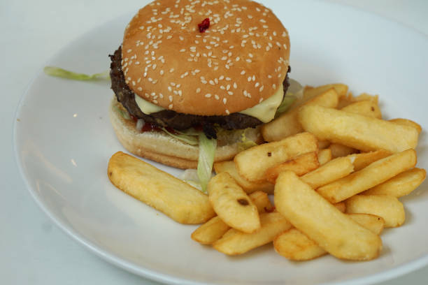 istock Classic beef Burger and fries 1221232985
