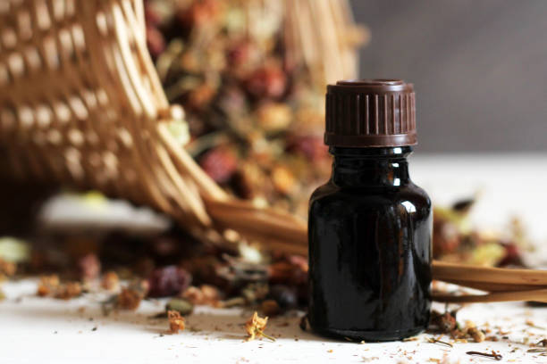 istock Medicinal herbal syrup and herb collection 1221233346