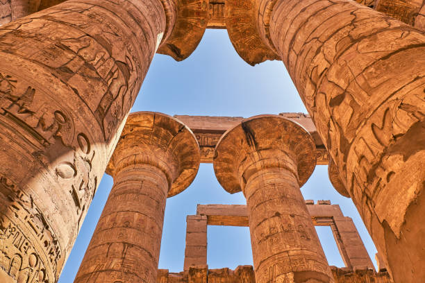 istock Massive pillars of the Great Hypostyle Hall within the Karnak temple complex (about 1250 BC), Luxor, Egypt 1221235278