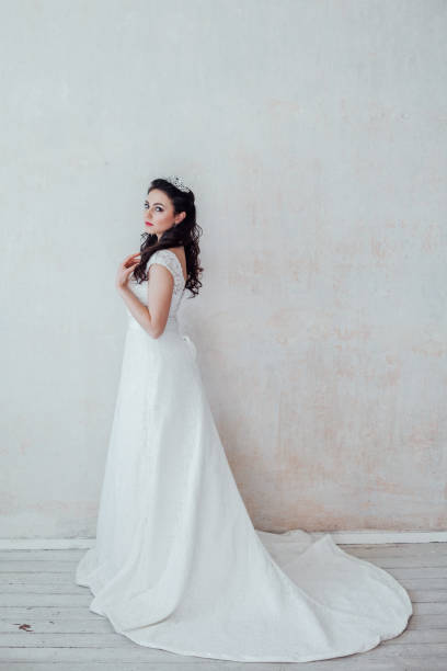 istock beautiful bride posing wedding hairstyle and dress 1221236704