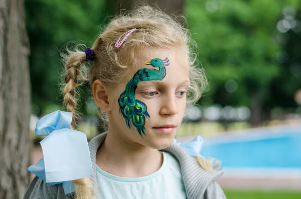 istock face painting of peacock 1221236867