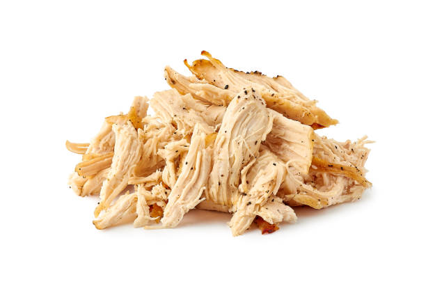 heap of pulled chicken meat on white - chicken roast chicken roasted white imagens e fotografias de stock