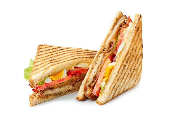 istock Two halves of fresh club sandwich on white 1221237652