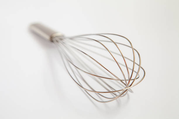 istock Metal whisk for whipping on a gray background. 1221237658