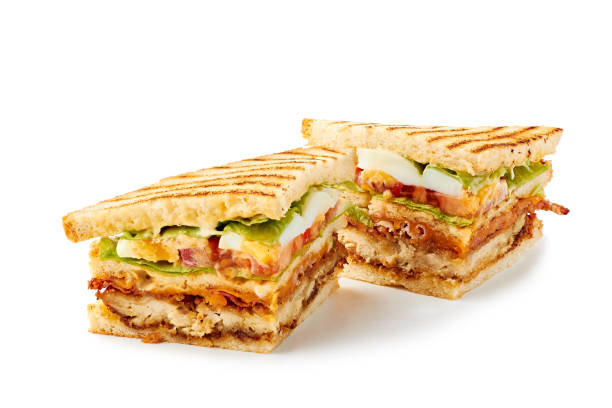 istock Two slices of club sandwich on white 1221237720
