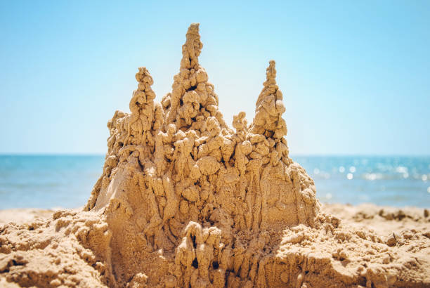 istock Sand castle on the sea coast 1221240837