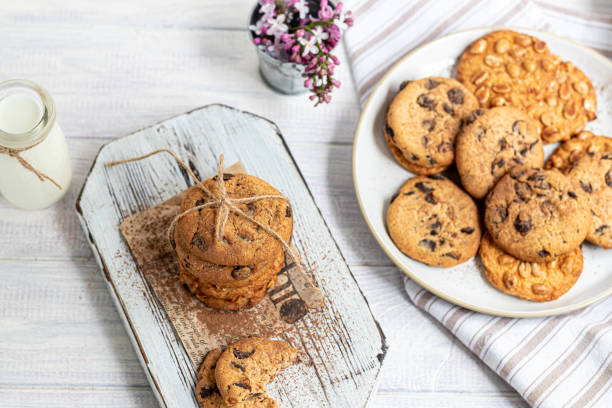 istock Chocolate Chip Cookies. Homemade baking. Round shape, medium size. On a white wooden background. 1221242187